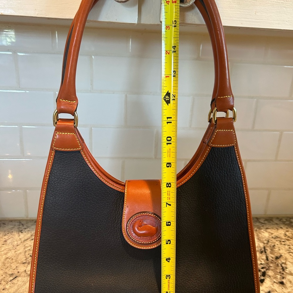Dooney and Burke Classic Black and Tan Leather Shoulder Bag